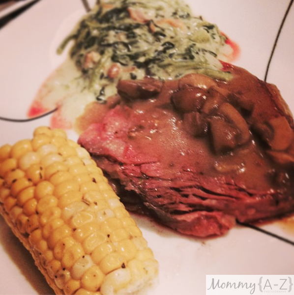 Prime rib with garlic butter corn and cream of spinach